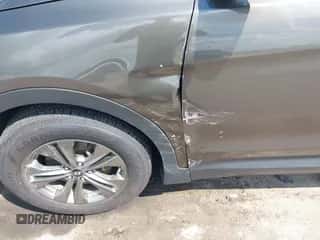 2014 Hyundai Santa Fe with VIN 5XYZUDLB1EG227778, listed as a IAAI auction lot 43033757 with 135,496 mi miles and . Bid and sale history available at DreamBid. Image 6.