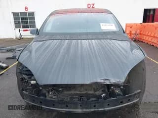 ✅ 2016 Tesla Model X 70D • VIN: 5YJXCBE29GF019542 • Lot: 43453345. Listed on IAAI with 127,876 mi. Free auction sales archive from the USA and detailed vehicle history report at DreamBid. Image 6.