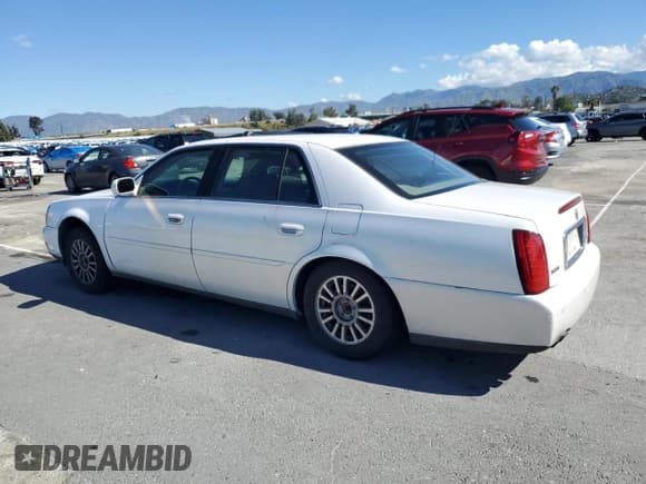 ✅ 2004 Cadillac DeVille DHS • VIN: 1G6KE57YX4U218189 • Lot: 49122094. Listed on Copart with 182,511 mi. Free auction sales archive from the USA and detailed vehicle history report at DreamBid. Image 2.