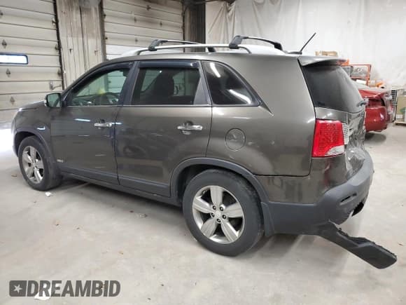 ✅ 2013 Kia Sorento EX • VIN: 5XYKUDA29DG391069 • Лот: 93184295. Опубликован ранее на Copart с пробегом 199 567 миль. Бесплатный доступ к архиву аукционных продаж из США и подробный отчёт об истории автомобиля на DreamBid. Изображение 2.