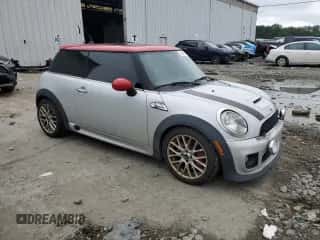 2013 MINI Hardtop John Cooper Works with VIN WMWSU9C54DT722551, listed as a Copart auction lot 61901185 with 176,413 mi miles and Salvage title. Bid and sale history available at DreamBid. Image 4.