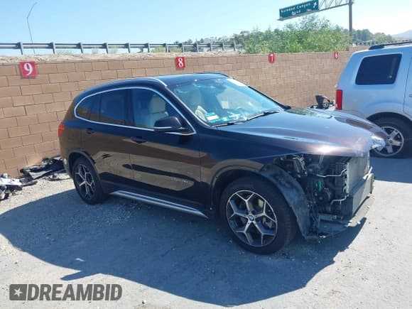 ✅ 2018 BMW X1 sDrive28i • VIN: WBXHU7C37J5L05511 • Lot: 42980003. Listed on IAAI with 25,925 mi. Free auction sales archive from the USA and detailed vehicle history report at DreamBid. Image 1.