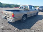 ✅ 1987 Mazda B-Series • VIN: JM2UF3117H0527890 • Lot: 42548541. Listed on IAAI with 196,593 mi. Free auction sales archive from the USA and detailed vehicle history report at DreamBid. Image 4.