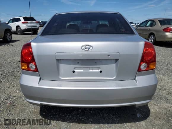 2005 Hyundai Accent GLS with VIN KMHCG45C65U576674, listed as a Copart auction lot 50726074 with 118,532 mi miles and Non repairable. Bid and sale history available at DreamBid. Image 6.