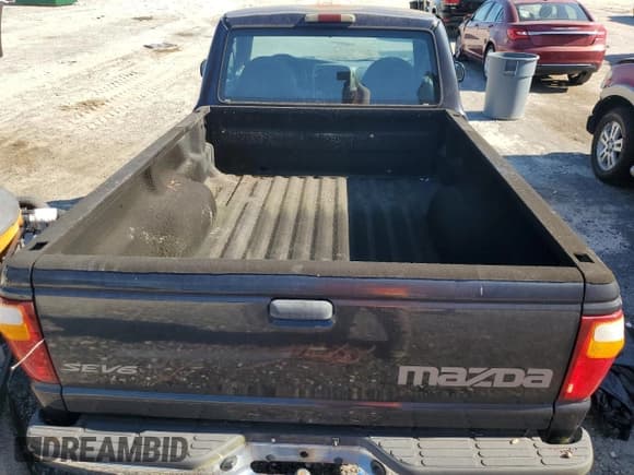 ✅ 2001 Mazda B-Series DS • VIN: 4F4YR12U81TM08882 • Lot: 66215955. Listed on Copart with 187,482 mi. Free auction sales archive from the USA and detailed vehicle history report at DreamBid. Image 10.