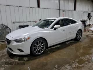 ✅ 2014 Mazda 6 i Grand Touring • VIN: JM1GJ1W54E1102570 • Lot: 94448515. Wystawiony na Copart z przebiegiem 180 607 mil. Bezpłatny archiwum sprzedaży aukcyjnych z USA i szczegółowy raport historii pojazdu na DreamBid. Zdjęcie 1.