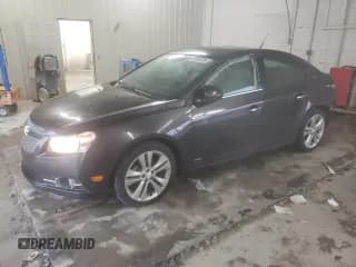 ✅ 2014 Chevrolet Cruze LTZ • VIN: 1G1PG5SB8E7268050 • Lot: 89808385. Listed on Copart with 120,971 mi. Free auction sales archive from the USA and detailed vehicle history report at DreamBid. Image 1.