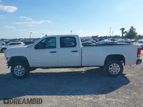 ✅ 2013 GMC Sierra 2500HD SLE • VIN: 1GT120CG1DF213551 • Lot: 43713202. Listed on IAAI with 264,434 mi. Free auction sales archive from the USA and detailed vehicle history report at DreamBid. Image 14.