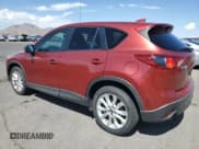 ✅ 2013 Mazda CX-5 Grand Touring • VIN: JM3KE2DE3D0154498 • Lot: 70603435. Wystawiony na Copart z przebiegiem 121 633 mil. Bezpłatny archiwum sprzedaży aukcyjnych z USA i szczegółowy raport historii pojazdu na DreamBid. Zdjęcie 2.