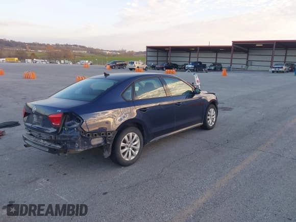 ✅ 2015 Volkswagen Passat S • VIN: 1VWAT7A31FC014572 • Lot: 43681668. Listed on IAAI with 197,929 mi. Free auction sales archive from the USA and detailed vehicle history report at DreamBid. Image 4.