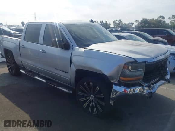 2018 Chevrolet Silverado 1500 LT with VIN 3GCPCREC8JG580088, listed as a IAAI auction lot 43278290 with 72,832 mi miles and . Bid and sale history available at DreamBid. Image 1.