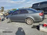 ✅ 2010 Volkswagen Jetta SE • VIN: 3VWRZ7AJ2AM127406 • Lot: 96116975. Listed on Copart with 153,298 mi. Free auction sales archive from the USA and detailed vehicle history report at DreamBid. Image 2.