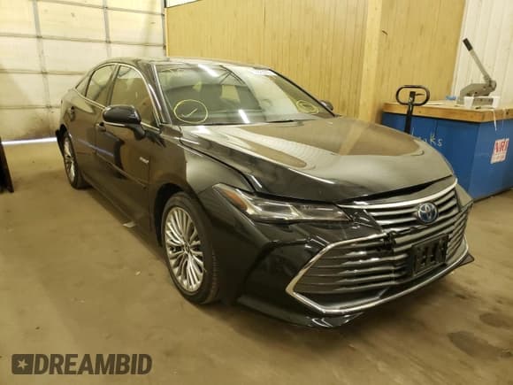 ✅ 2021 Toyota Avalon Limited Hybrid • VIN: 4T1CA1AB3MU001055 • Лот: 62823372. Опубликован ранее на Copart с пробегом 14 776 миль. Бесплатный доступ к архиву аукционных продаж из США и подробный отчёт об истории автомобиля на DreamBid. Изображение 1.
