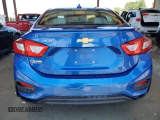 ✅ 2018 Chevrolet Cruze LT • VIN: 1G1BE5SM2J7156632 • Lot: 56020013. Listed on Copart with 78,095 mi. Free auction sales archive from the USA and detailed vehicle history report at DreamBid. Image 6.