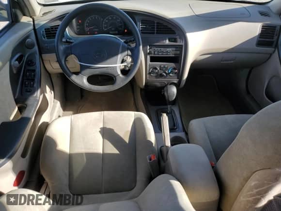 2003 Hyundai Elantra GLS z VIN KMHDN45D13U521386, wystawiony jako Copart lot #75726144 z przebiegiem 169 663 mil mil oraz Szkoda całkowita • Salvage title. Historia ofert i sprzedaży dostępna na DreamBid. Obrazek 8.