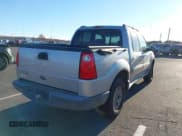 ✅ 2005 Ford Explorer Sport Trac XLS • VIN: 1FMZU77K45UB18012 • Lot: 43635139. Wystawiony na IAAI z przebiegiem 91 629 mil. Bezpłatny archiwum sprzedaży aukcyjnych z USA i szczegółowy raport historii pojazdu na DreamBid. Zdjęcie 4.