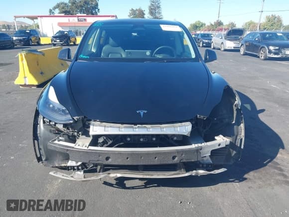 ✅ 2024 Tesla Model Y Long Range • VIN: 7SAYGDEE3RF983817 • Lot: 43496471. Wystawiony na IAAI z przebiegiem 161 377 mil. Bezpłatny archiwum sprzedaży aukcyjnych z USA i szczegółowy raport historii pojazdu na DreamBid. Zdjęcie 13.