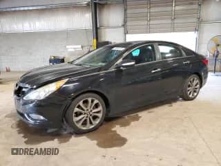 2013 Hyundai Sonata SE with VIN 5NPEC4AB5DH690793, listed as a Copart auction lot 84656755 with 182,641 mi miles and Salvage title. Bid and sale history available at DreamBid. Image 1.