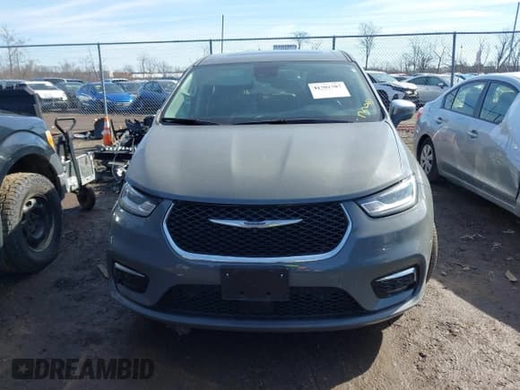 ✅ 2022 Chrysler Pacifica Hybrid Limited • VIN: 2C4RC1S71NR143650 • Лот: 41701707. Опубликован ранее на IAAI с пробегом 32 094 миль. Бесплатный доступ к архиву аукционных продаж из США и подробный отчёт об истории автомобиля на DreamBid. Изображение 12.
