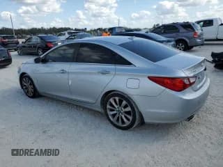 ✅ 2013 Hyundai Sonata SE • VIN: 5NPEC4AC1DH724107 • Lot: 77069404. Listed on Copart with 92,245 mi. Free auction sales archive from the USA and detailed vehicle history report at DreamBid. Image 2.