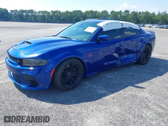 ✅ 2022 Dodge Charger Scat Pack Widebody • VIN: 2C3CDXGJ0NH176255 • Lot: 39576763. Wystawiony na IAAI z przebiegiem 18 324 mil. Bezpłatny archiwum sprzedaży aukcyjnych z USA i szczegółowy raport historii pojazdu na DreamBid. Zdjęcie 2.