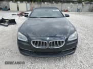 ✅ 2013 BMW 6 Series 650i • VIN: WBAYP9C52DD168793 • Лот: 93090135. Опубликован ранее на Copart с пробегом 110 729 миль. Бесплатный доступ к архиву аукционных продаж из США и подробный отчёт об истории автомобиля на DreamBid. Изображение 5.