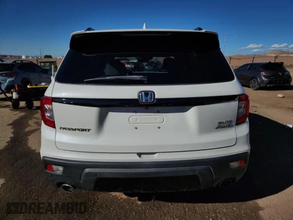 ✅ 2020 Honda Passport Elite • VIN: 5FNYF8H03LB002898 • Lot: 83825895. Listed on Copart with 117,269 mi. Free auction sales archive from the USA and detailed vehicle history report at DreamBid. Image 6.