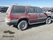 ✅ 1999 Mercury Mountaineer • VIN: 4M2ZU52E6XUJ43842 • Lot: 88141505. Listed on Copart with 194,187 mi. Free auction sales archive from the USA and detailed vehicle history report at DreamBid. Image 3.