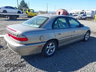 ✅ 1999 Cadillac Catera • VIN: W06VR52R3XR015538 • Lot: 43436028. Listed on IAAI with 172,334 mi. Free auction sales archive from the USA and detailed vehicle history report at DreamBid. Image 4.