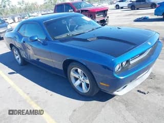 ✅ 2009 Dodge Challenger SE • VIN: 2B3LJ44V09H522094 • Lot: 43488763. Listed on IAAI with 243,342 mi. Free auction sales archive from the USA and detailed vehicle history report at DreamBid. Image 1.