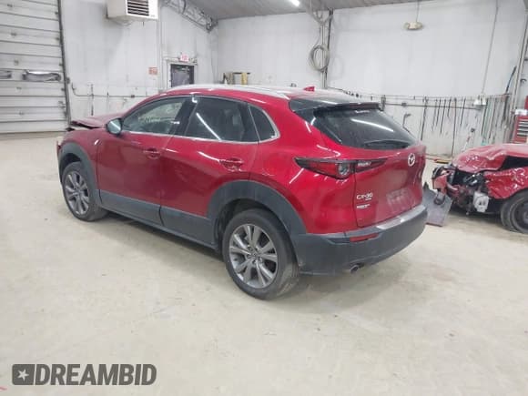 ✅ 2022 Mazda CX-30 S Premium • VIN: 3MVDMBDL0NM412458 • Lot: 43196761. Wystawiony na IAAI z przebiegiem 24 089 mil. Bezpłatny archiwum sprzedaży aukcyjnych z USA i szczegółowy raport historii pojazdu na DreamBid. Zdjęcie 3.