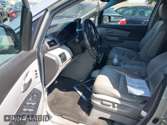 ✅ 2012 Honda Odyssey Touring • VIN: 5FNRL5H91CB004546 • Lot: 42175002. Listed on IAAI with 118,719 mi. Free auction sales archive from the USA and detailed vehicle history report at DreamBid. Image 5.