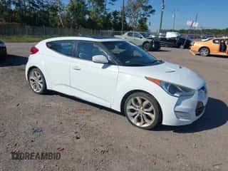 2012 Hyundai Veloster w/Red Int с VIN KMHTC6AD6CU028161, выставлен на аукционе IAAI как лот 43564329 с пробегом 98 673 миль миль и . История ставок и продаж доступна на DreamBid. Изображение 1.