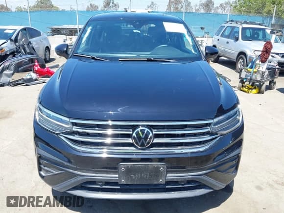 ✅ 2023 Volkswagen Tiguan S • VIN: 3VVRB7AX3PM064709 • Lot: 42103656. Listed on IAAI with 17,157 mi. Free auction sales archive from the USA and detailed vehicle history report at DreamBid. Image 13.