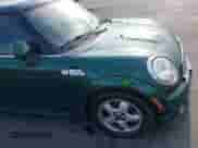 2011 MINI Hardtop with VIN WMWSU3C58BT091720, listed as a IAAI auction lot 42875190 with 60,918 mi miles and . Bid and sale history available at DreamBid. Image 18.