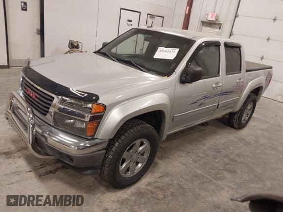 ✅ 2011 GMC Canyon SLT • VIN: 1GTH6NFE2B8131890 • Lot: 43561431. Listed on IAAI with 114,728 mi. Free auction sales archive from the USA and detailed vehicle history report at DreamBid. Image 2.