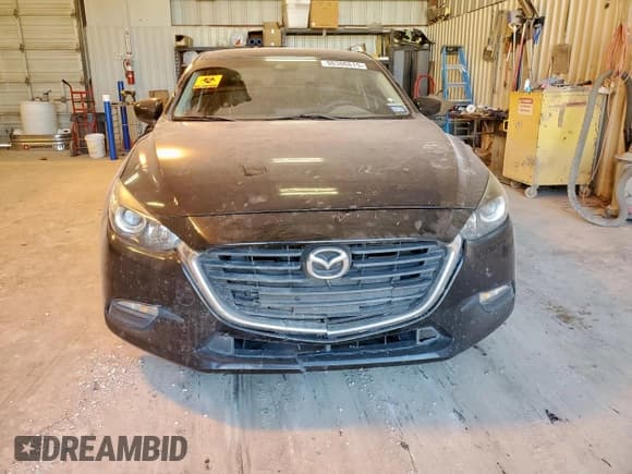 ✅ 2017 Mazda 3 Touring • VIN: JM1BN1L37H1134208 • Лот: 90306615. Опубликован ранее на Copart с пробегом 128 720 миль. Бесплатный доступ к архиву аукционных продаж из США и подробный отчёт об истории автомобиля на DreamBid. Изображение 5.