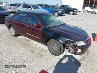 ✅ 2001 Mazda 626 LX • VIN: 1YVGF22D815201913 • Lot: 43597675. Listed on IAAI with 268,154 mi. Free auction sales archive from the USA and detailed vehicle history report at DreamBid. Image 1.