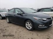 ✅ 2018 Chevrolet Cruze LT • VIN: 1G1BE5SM0J7152868 • Lot: 69955462. Listed on Copart with 34,455 mi. Free auction sales archive from the USA and detailed vehicle history report at DreamBid. Image 4.