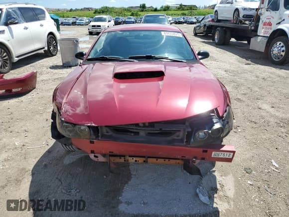 ✅ 2004 Ford Mustang Standard • VIN: 1FAFP40454F104086 • Lot: 80885815. Listed on Copart with 130,176 mi. Free auction sales archive from the USA and detailed vehicle history report at DreamBid. Image 5.