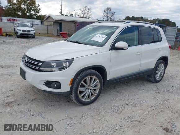 ✅ 2013 Volkswagen Tiguan S • VIN: WVGAV3AX4DW603793 • Lot: 43754789. Listed on IAAI with 222,424 mi. Free auction sales archive from the USA and detailed vehicle history report at DreamBid. Image 2.