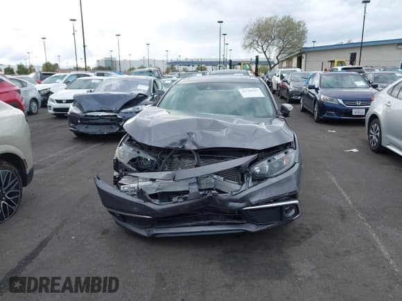 ✅ 2019 Honda Civic EX • VIN: 19XFC1F34KE208482 • Lot: 43760107. Listed on IAAI with 71,283 mi. Free auction sales archive from the USA and detailed vehicle history report at DreamBid. Image 6.