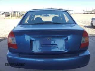 2002 Hyundai Accent GL with VIN KMHCG45C32U332833, listed as a Copart auction lot 66539644 with 69,763 mi miles and Salvage title. Bid and sale history available at DreamBid. Image 6.