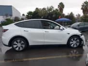 ✅ 2023 Tesla Model Y Long Range • VIN: 7SAYGDEE7PA091564 • Лот: 43693505. Опубликован ранее на IAAI с пробегом 31 250 миль. Бесплатный доступ к архиву аукционных продаж из США и подробный отчёт об истории автомобиля на DreamBid. Изображение 14.