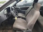 ✅ 1993 Pontiac Sunbird • VIN: 1G2JC14H4P7534125 • Lot: 62702385. Wystawiony na Copart z przebiegiem 123 102 mil. Bezpłatny archiwum sprzedaży aukcyjnych z USA i szczegółowy raport historii pojazdu na DreamBid. Zdjęcie 7.