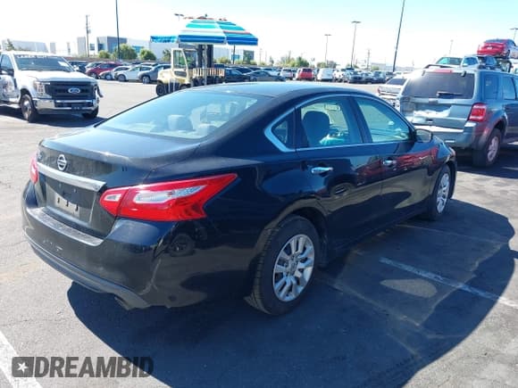 ✅ 2016 Nissan Altima SR • VIN: 1N4AL3AP1GC233697 • Lot: 43435513. Listed on IAAI with 241,036 mi. Free auction sales archive from the USA and detailed vehicle history report at DreamBid. Image 4.