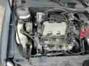 2002 Chevrolet Malibu LS z VIN 1G1NE52J72M586291, wystawiony jako Copart lot #84828864 z przebiegiem 187 205 mil mil oraz Szkoda całkowita • Salvage title. Historia ofert i sprzedaży dostępna na DreamBid. Obrazek 14.