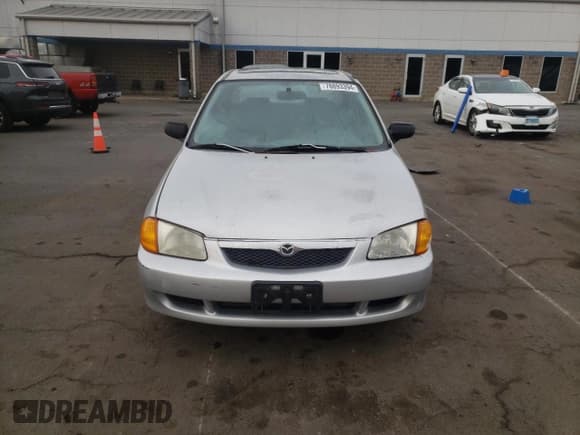 ✅ 1999 Mazda Protege ES • VIN: JM1BJ2218X0153260 • Lot: 78893394. Wystawiony na Copart z przebiegiem 196 034 mil. Bezpłatny archiwum sprzedaży aukcyjnych z USA i szczegółowy raport historii pojazdu na DreamBid. Zdjęcie 5.