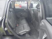 ✅ 2013 Ford Escape Titanium • VIN: 1FMCU0J90DUA76892 • Lot: 43769603. Listed on IAAI with 129,881 mi. Free auction sales archive from the USA and detailed vehicle history report at DreamBid. Image 8.