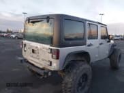 ✅ 2012 Jeep Wrangler Unlimited Sport • VIN: 1C4BJWDG8CL143023 • Lot: 43447646. Listed on IAAI with 119,924 mi. Free auction sales archive from the USA and detailed vehicle history report at DreamBid. Image 4.